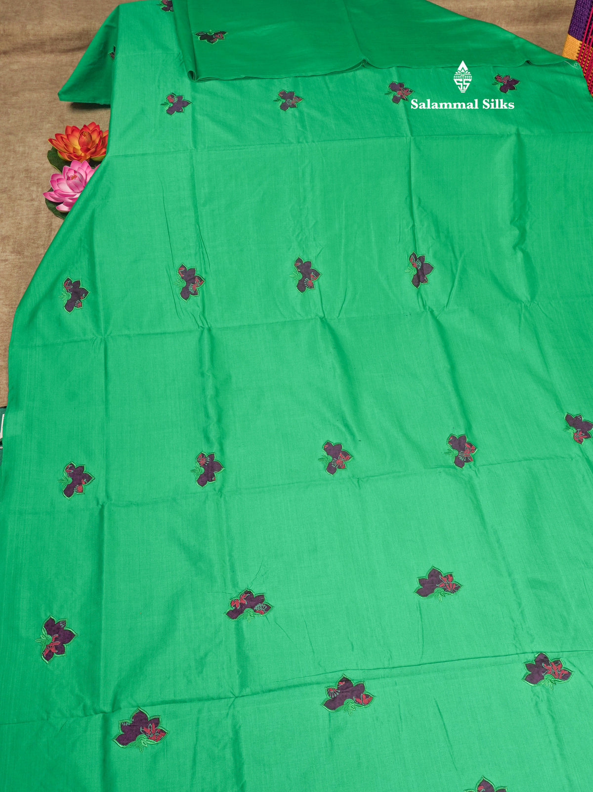 Saffire Green South Cotton Printed Saree With Contrast Purple Blouse