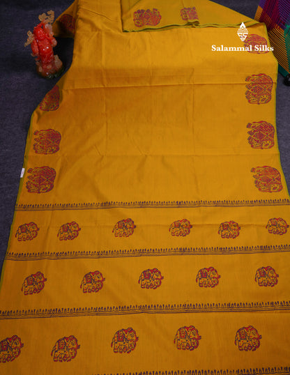 Beautiful Yellow South Cotton Printed Saree With Contrast Dark Purple Blouse