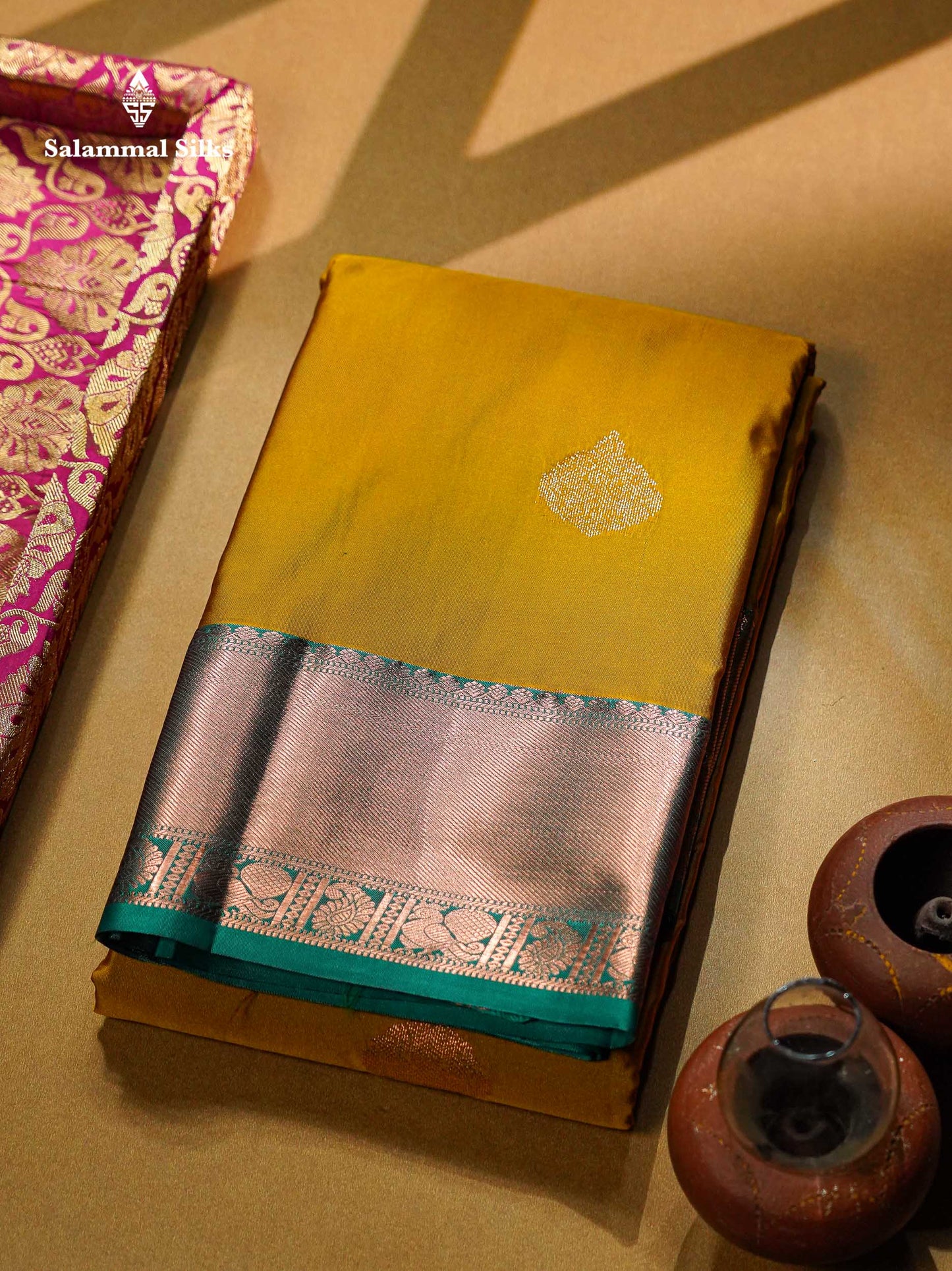 Beautiful Cream Sandal Zari Butta Semi Silk Saree With Contrast Sapphire Green Traditional Border
