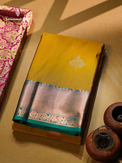 Beautiful Cream Sandal Zari Butta Semi Silk Saree With Contrast Sapphire Green Traditional Border