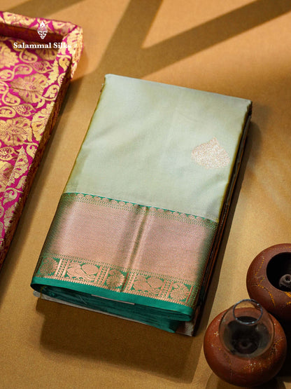 Beautiful Cream Sandal Zari Butta Semi Silk Saree With Contrast Sapphire Green Traditional Border