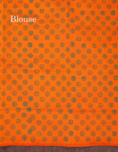 Beautiful Peacock Green South Cotton Printed Saree With Contrast Orange Blouse