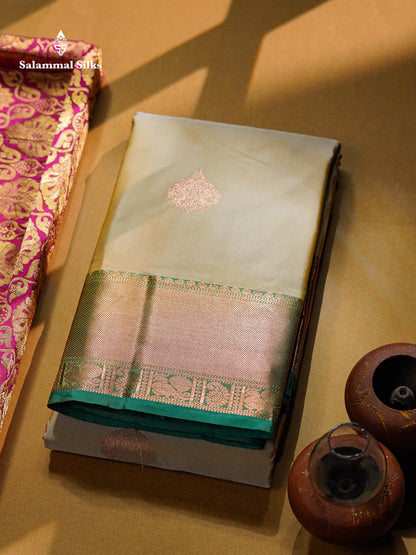 Beautiful Cream Sandal Zari Butta Semi Silk Saree With Contrast Sapphire Green Traditional Border