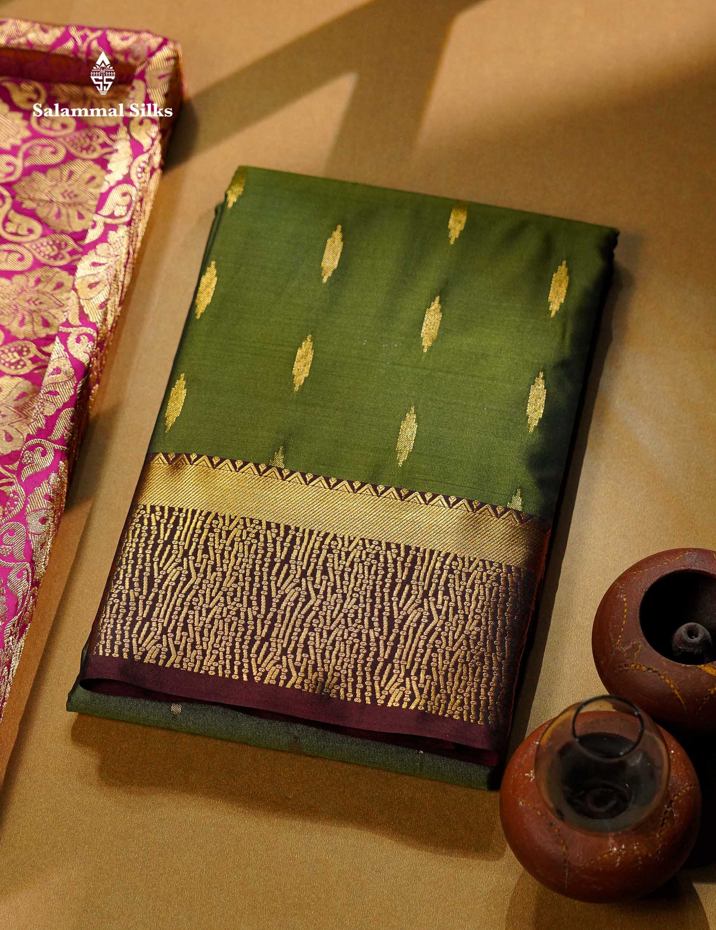 Beautiful Olive Green Malli Moggu Butta Semi Silk Saree With Contrast Dark Brown Fancy Border