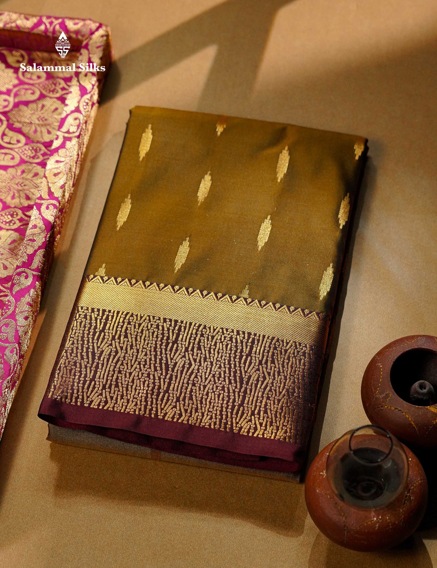 Beautiful Olive Green Malli Moggu Butta Semi Silk Saree With Contrast Dark Brown Fancy Border