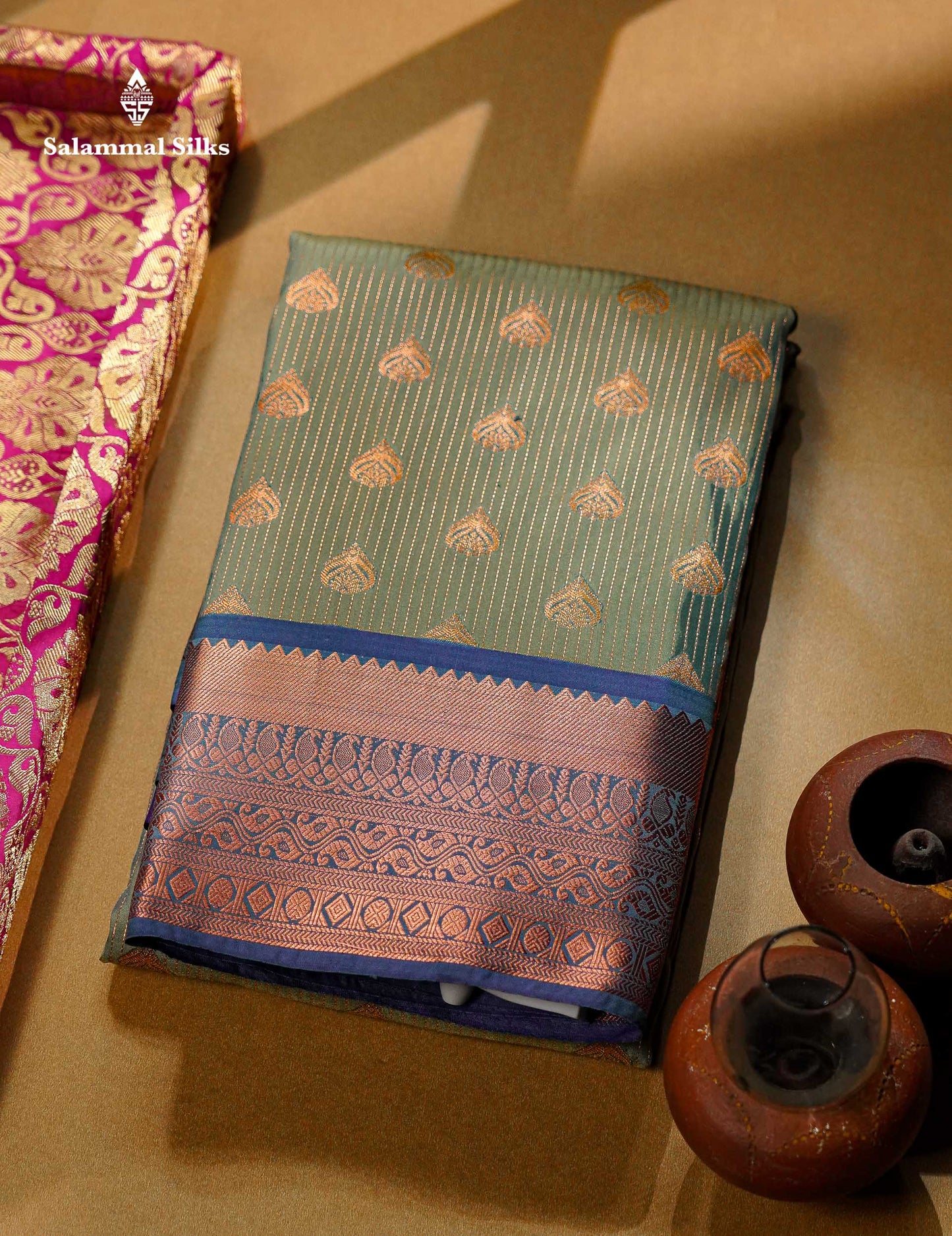 Beautiful Light Elaichi Green Zari Lines With Butta Semi Silk Saree With Contrast Dual Tone Blue Traditional Border