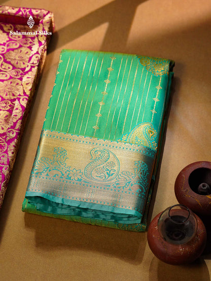Beautiful Dark Maroon Zari Lines With Butta Semi Silk Saree With Contrast Bottle Green Traditional Border
