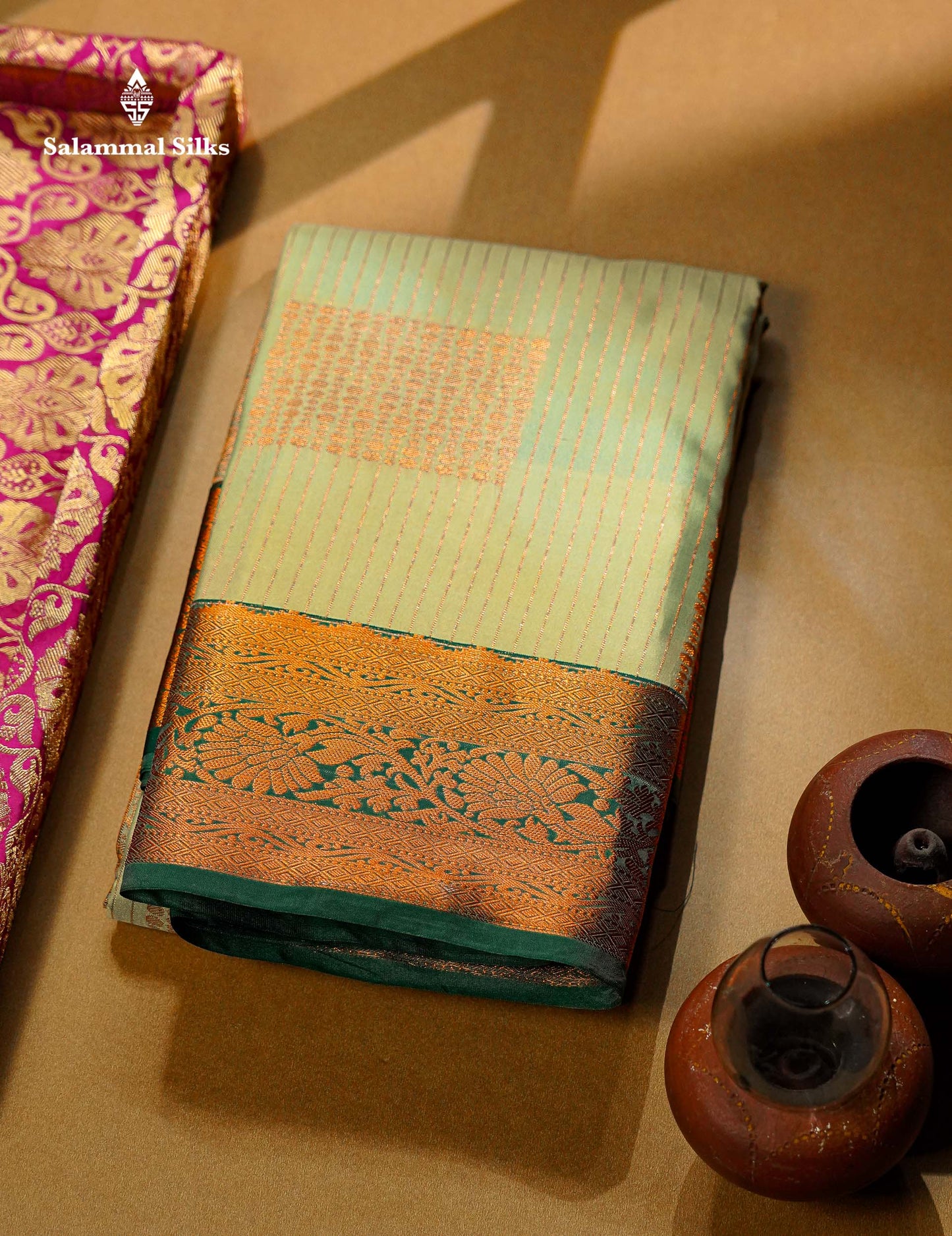 Beautiful Light Elaichi Green Zari Lines With Butta Semi Silk Saree With Contrast Bottle Green Traditional Border