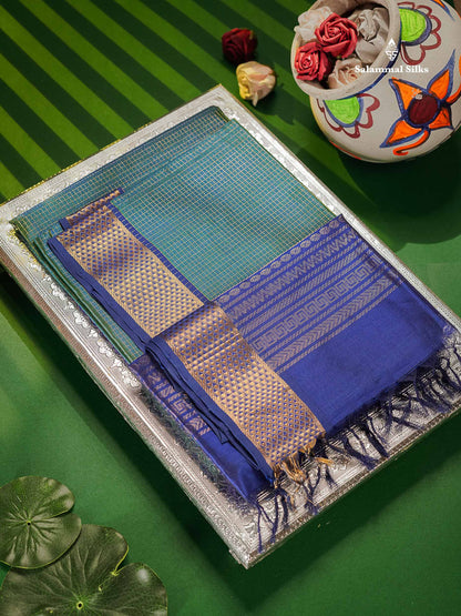 Pure Silk Cotton Saree - Dual Tone Peacock Blue Colour Body Small Zari Checks With Contrast Blue Border