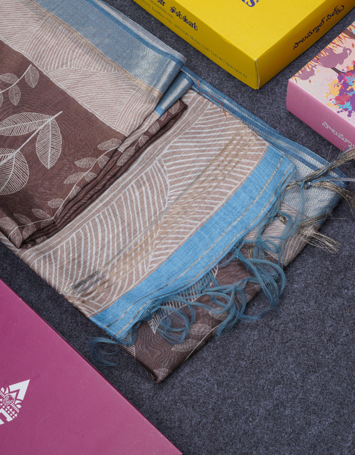 Brown Semi Crepe Silk Fancy Saree With Contrast Ramar Blue Small Border