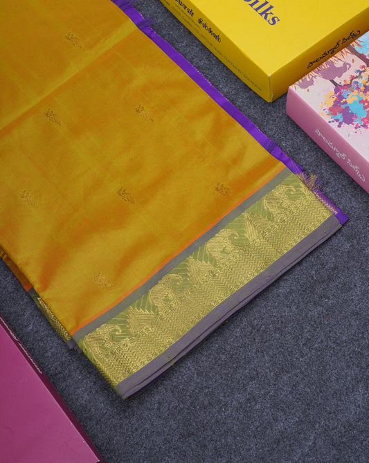 Beautiful Manthulir Yellow Semi Silk Cotton Saree With Contrast Purple Traditional Border