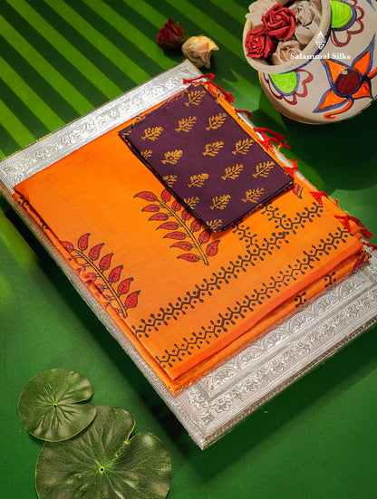 South Cotton Saree - Orange Printed Saree With Contrast Dark Purple Blouse