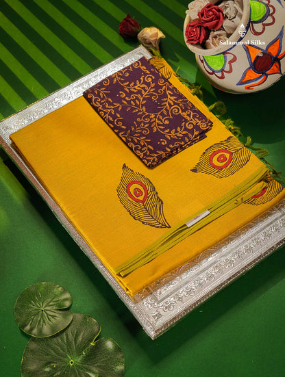 South Cotton Saree - Manthulir Yellow Printed Saree With Contrast Dark Purple Blouse