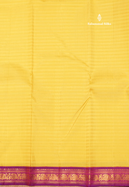 Korvai Yellow Pure Kanjivaram Silk Saree With Small Magenta Border