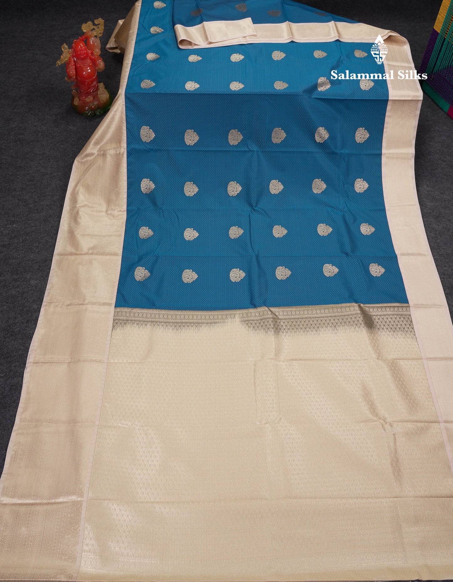 Beautiful Peacock Blue Emboss Design Semi Silk Saree With Cream Traditional Evening Morning Border