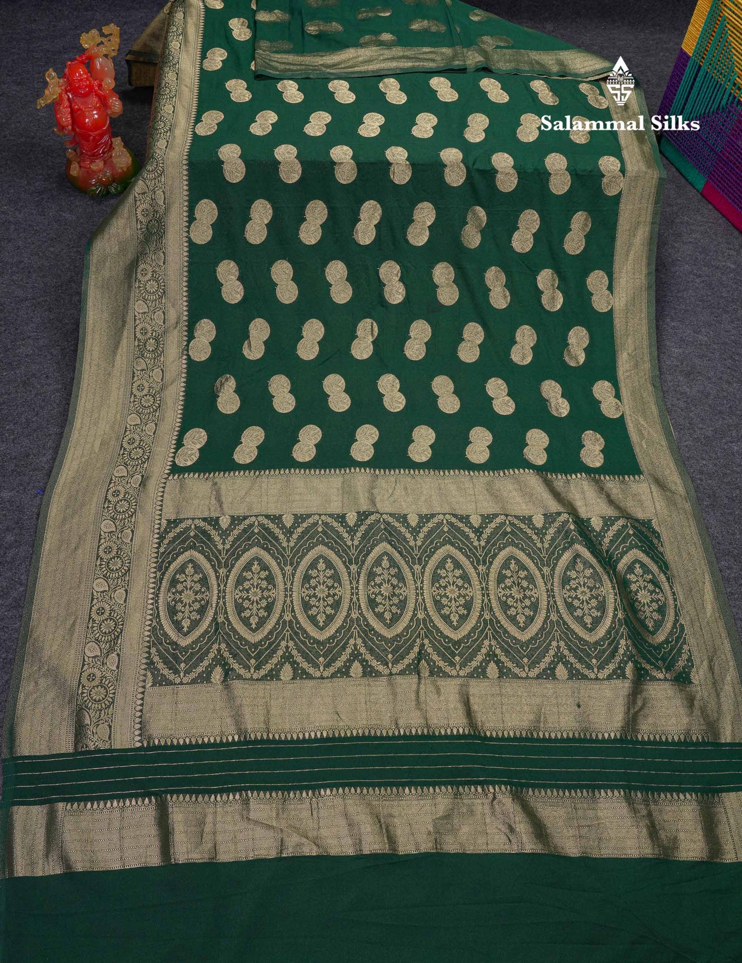 Beautiful Bottle Green Semi Georgette Saree With Fancy Border