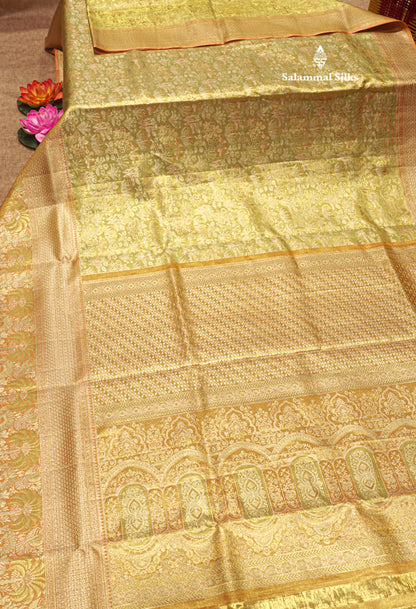 Green Colour Pure Kanjivaram Tissue Silk Saree with Contrast Peach Border