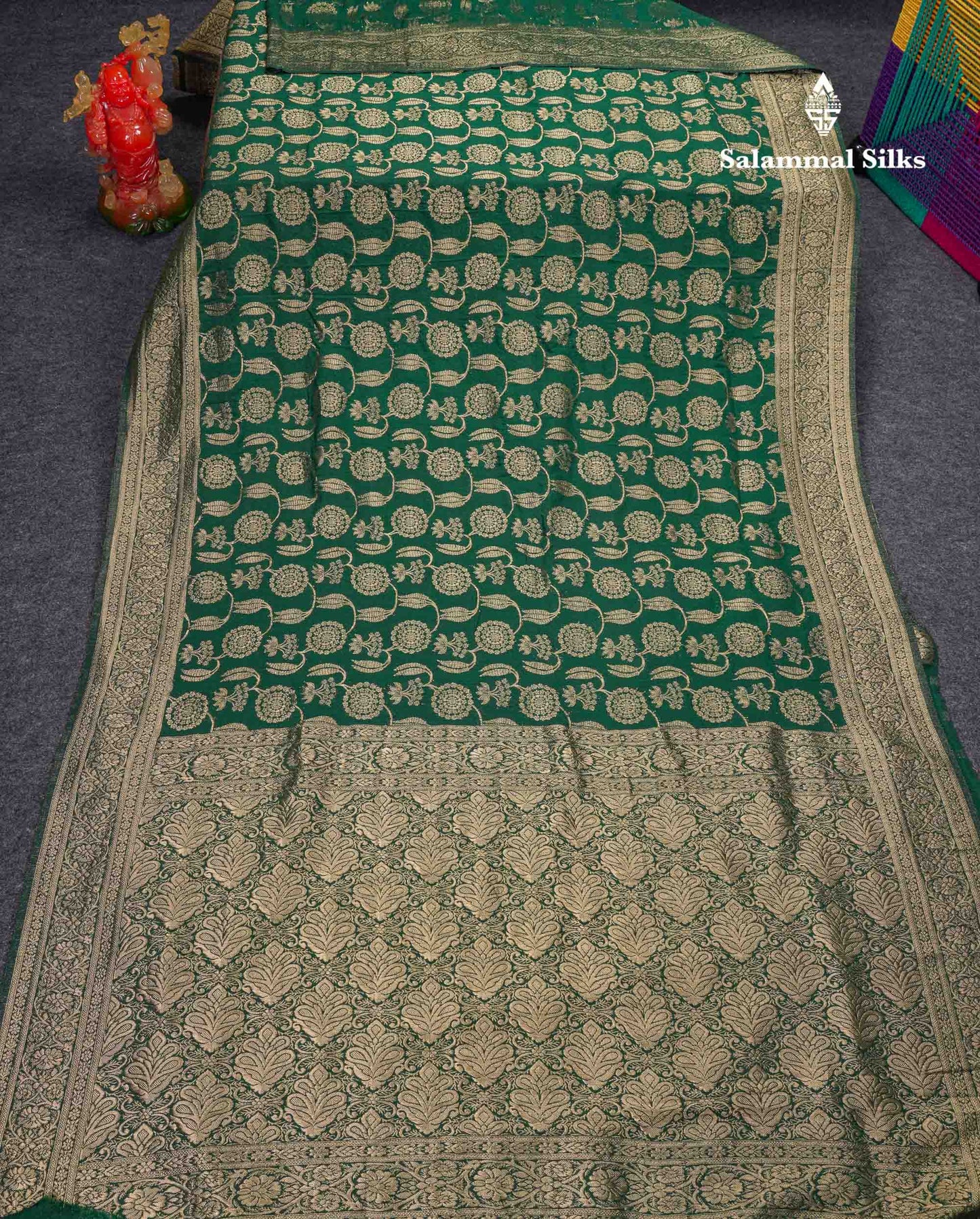 Beautiful Bottle Green Semi Georgette Saree With Fancy Border