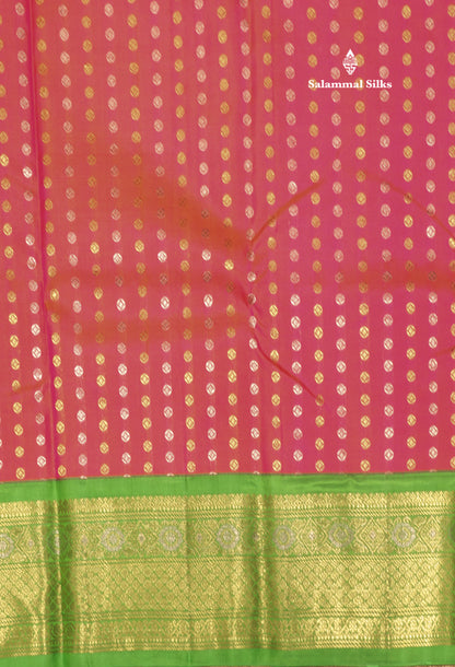 Pinkish Orange Colour Pure Kanjivaram Silk Saree With Contrast Parrot Green Border