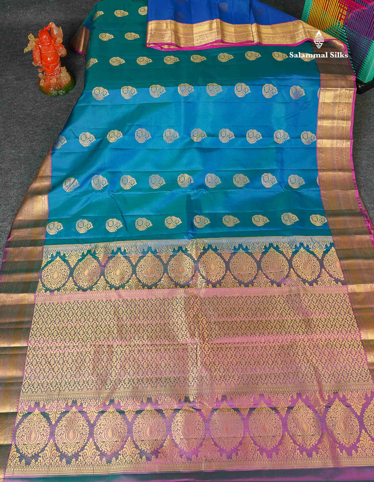 Pure Kanjivaram Silk Saree - Dual Tone Peacock Blue Colour Body With Traditional Border