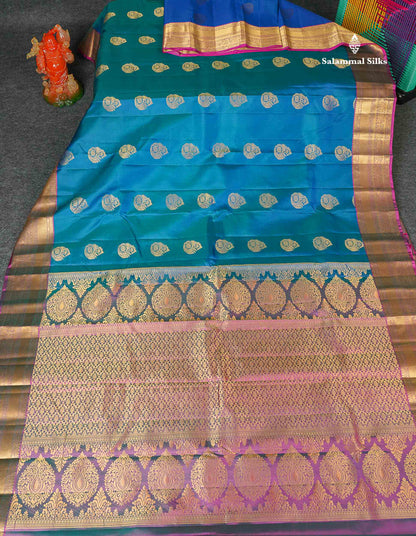 Pure Kanjivaram Silk Saree - Dual Tone Peacock Blue Colour Body With Traditional Border