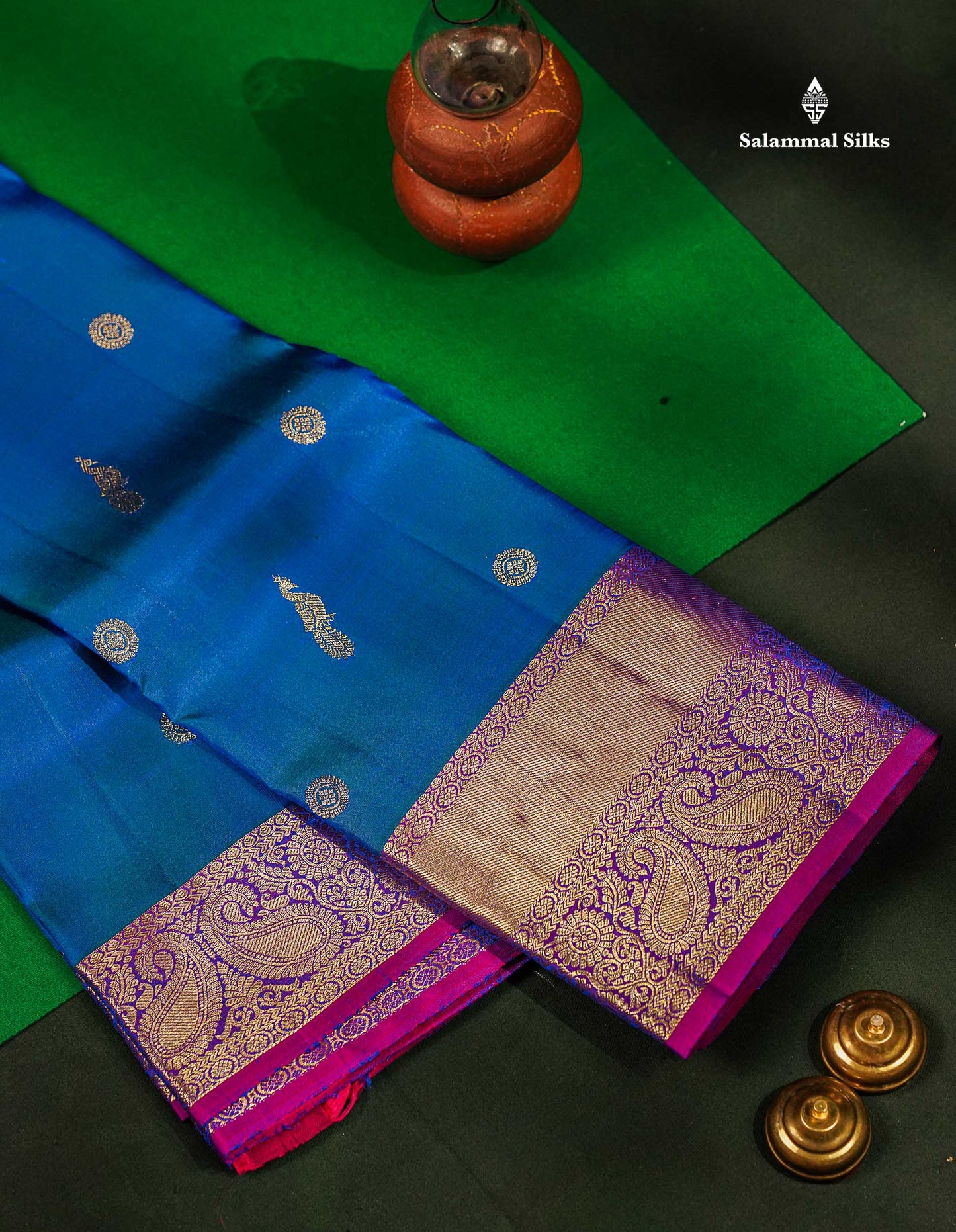 Pure Kanjivaram Silk Saree - Dual Tone Peacock Blue Chakaram & Peacock Butta Along With Contrast Dual Tone Purple Traditional Evening Morning Border