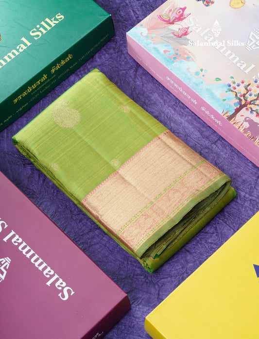 Parrot Green Traditional Buttas Pure Kanjivaram Silk Saree Pure Zari with Pink Border