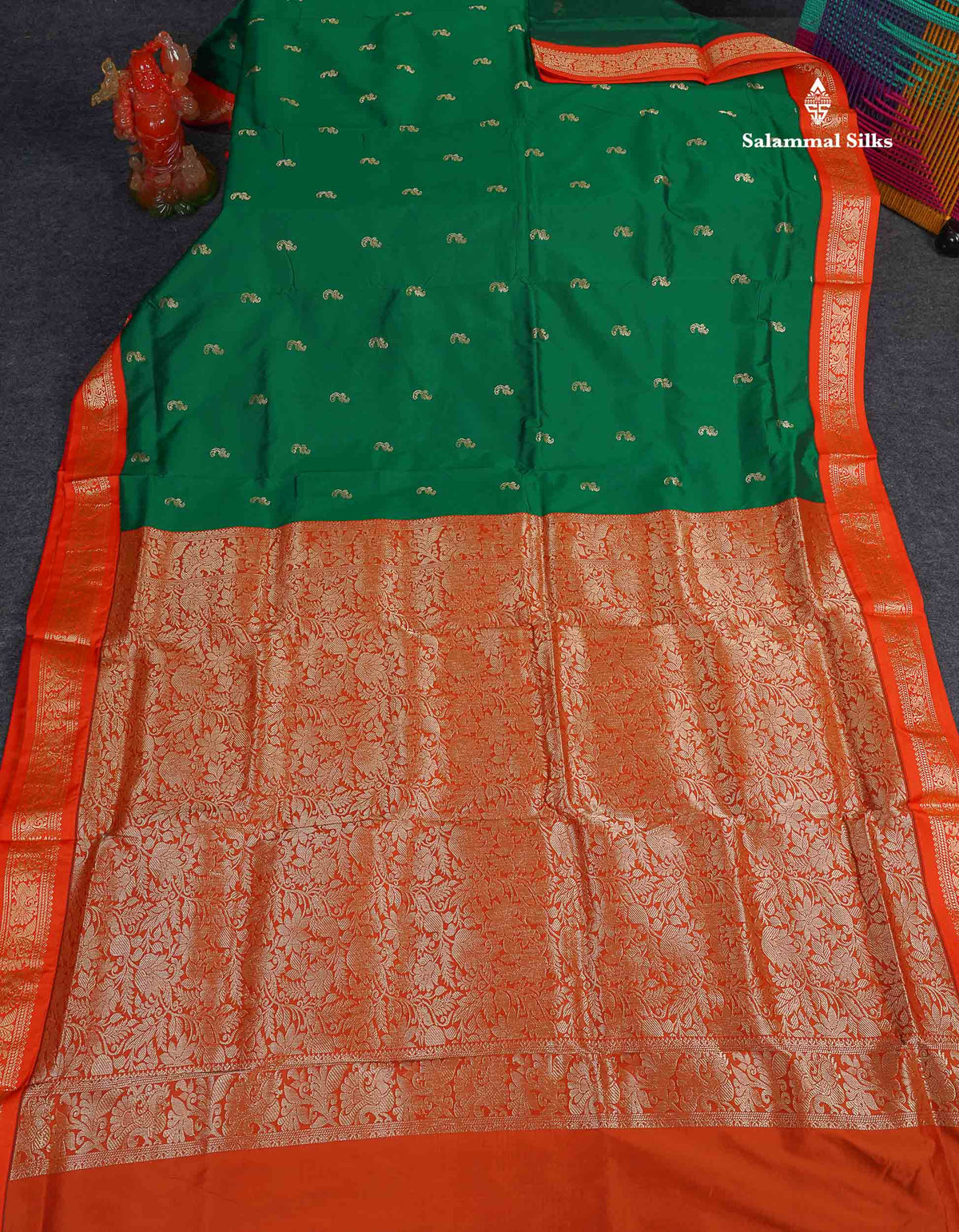 Semi Silk Saree - Bottle Green Colour Body Zari Butta With Orange Border | 9.5 Yards