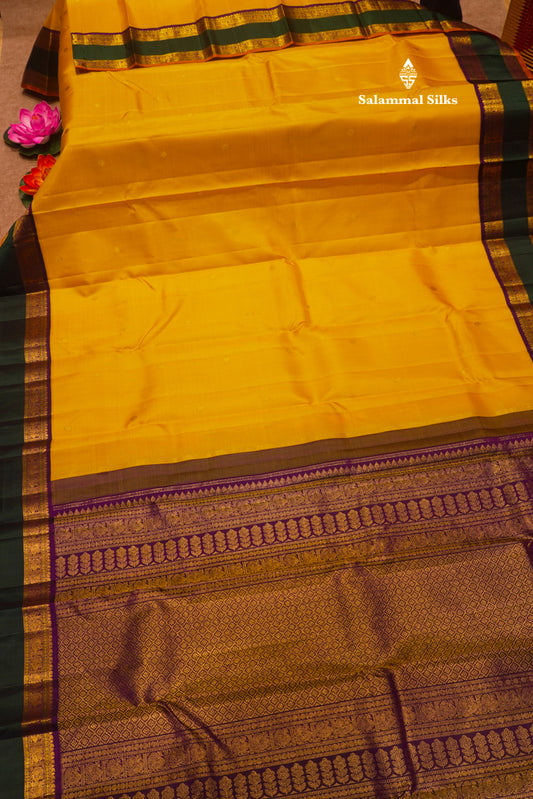Korvai Yellow Pure Kanjivaram Silk Saree With Traditional Green Double Border