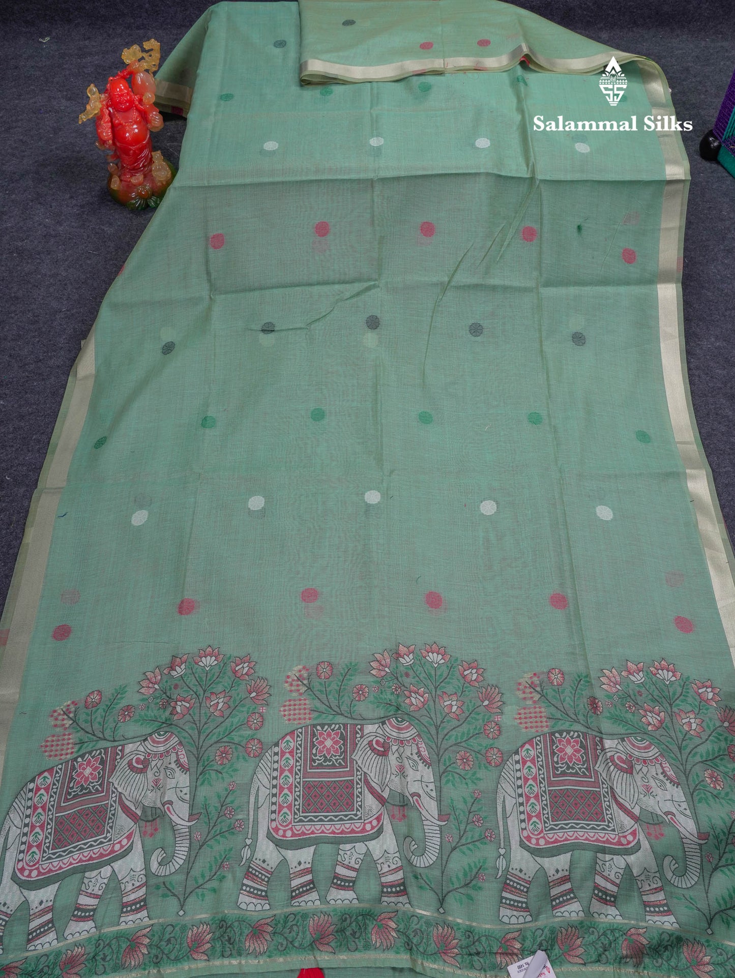 Beautiful Sapphire Green Thread Work Butta Muga Cotton Saree With Contrast Peacock Blue Blouse