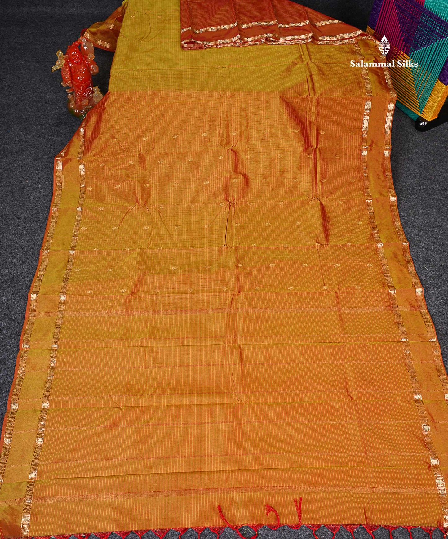 Semi Silk Saree - Light Orange Colour Body Zari Checks With Butta & Traditional Rettapet Border