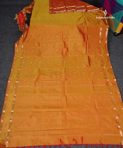 Semi Silk Saree - Light Orange Colour Body Zari Checks With Butta & Traditional Rettapet Border