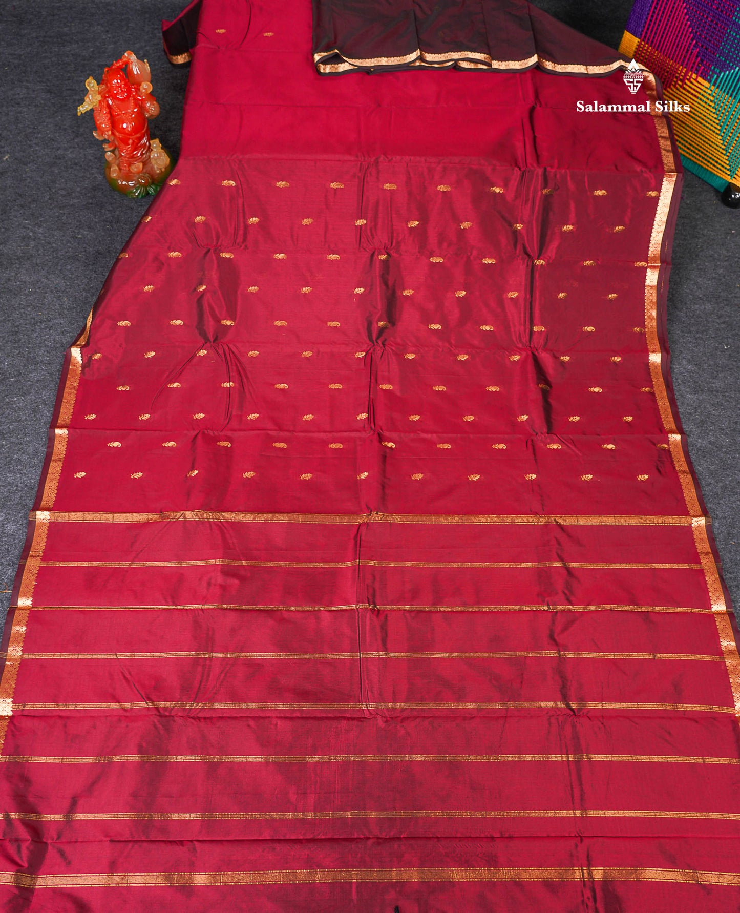 Semi Silk Saree - Maroon Colour Body Zari Butta With Traditional Small Border