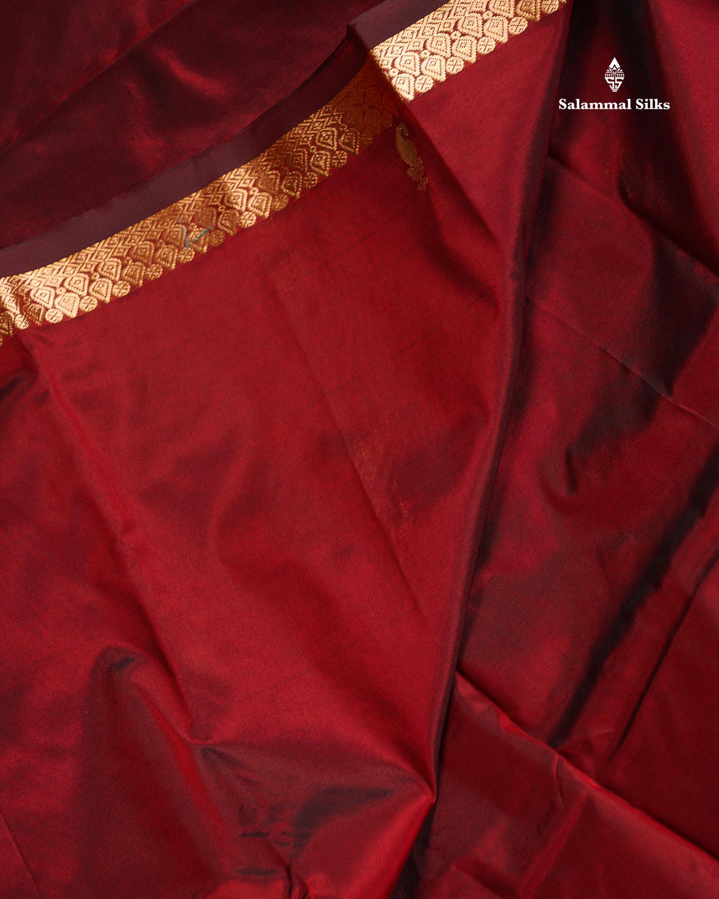 Semi Silk Saree - Maroon Colour Body Zari Butta With Traditional Small Border