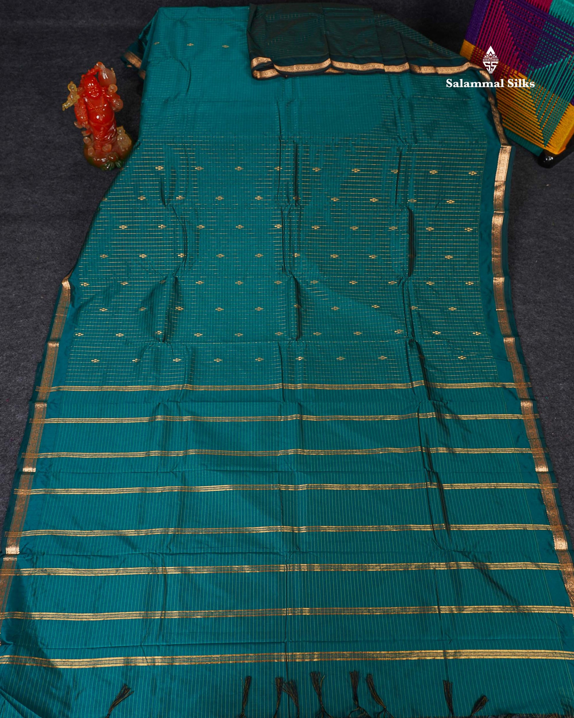 Semi Silk Saree - Peacock Blue Colour Body Zari Checks With Butta & Traditional Small Border