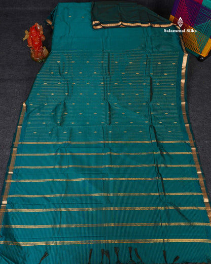 Semi Silk Saree - Peacock Blue Colour Body Zari Checks With Butta & Traditional Small Border