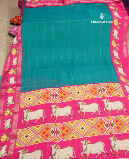 Bottle Green Semi Crepe Saree With Contrast Reddish Pink Border