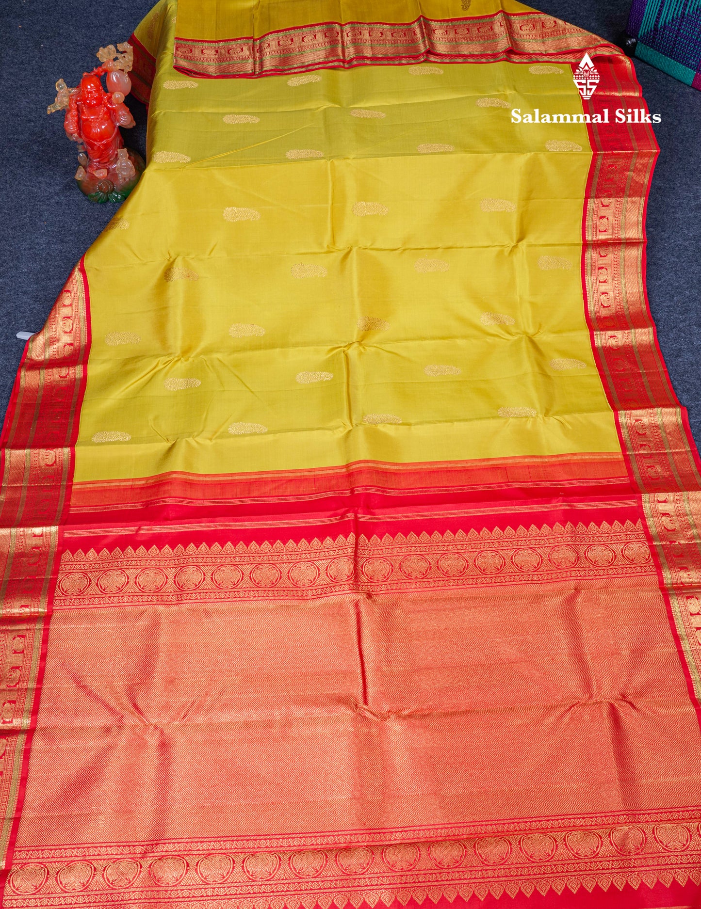 Manthulir Yellow Pure Kanjivaram Silk Saree With Contrast Chilly Red Traditional Border