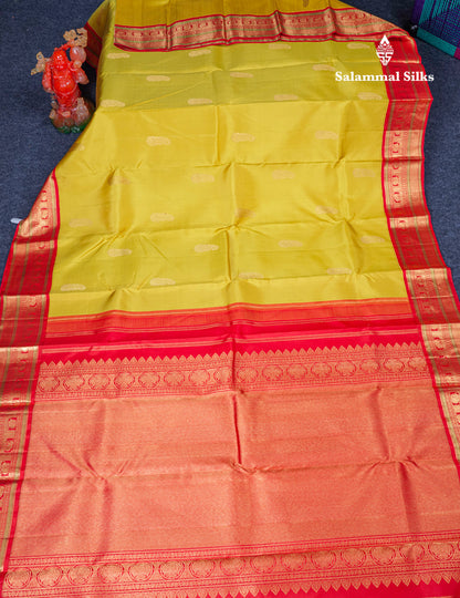 Manthulir Yellow Pure Kanjivaram Silk Saree With Contrast Chilly Red Traditional Border