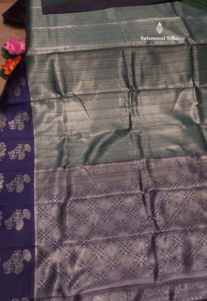Peacock Green Colour Semi Silk Tissue Saree With Contrast Navy Blue Border