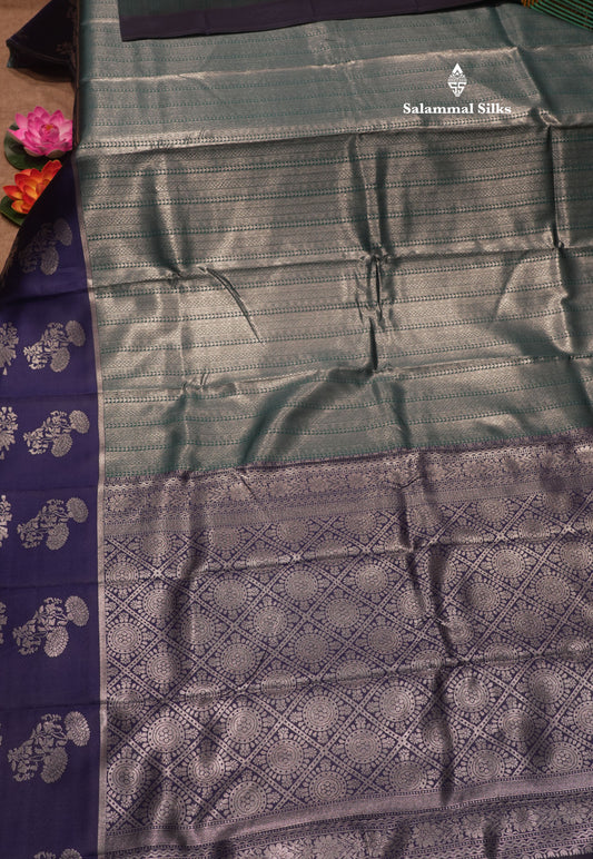Peacock Green Colour Semi Silk Tissue Saree With Contrast Navy Blue Border