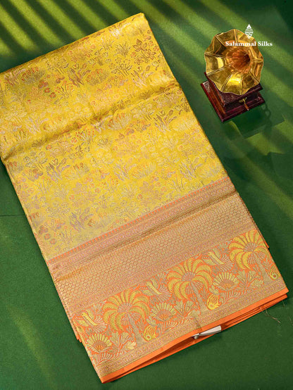 Green Colour Pure Kanjivaram Tissue Silk Saree with Contrast Peach Border