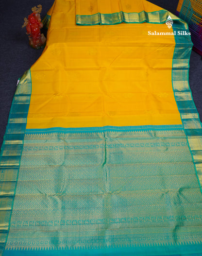 Korvai Yelllow Pure Kanjivaram Silk Saree With Contrast Dual Tone Sapphire Green Traditional Border