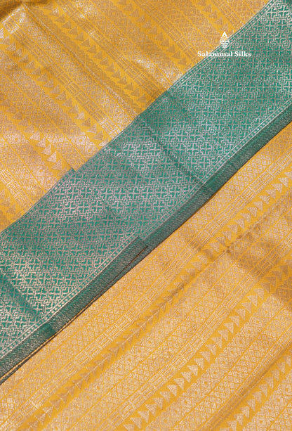 Mustard Yellow Colour Semi Silk Tissue Saree With Contrast Sapphire Green Border