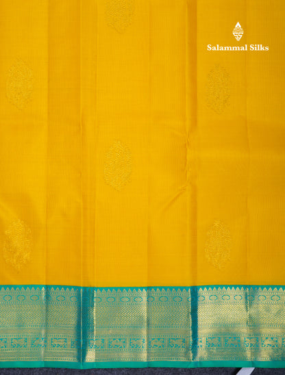Korvai Yelllow Pure Kanjivaram Silk Saree With Contrast Dual Tone Sapphire Green Traditional Border