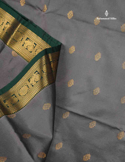 Semi Silk Saree -  Grey Colour Body Butta With Contrast Bottle Green Traditional Small Border