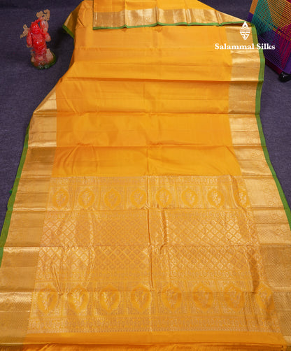Beautiful Yellow Plain Pure Kanjivaram Silk Saree With Traditional Border