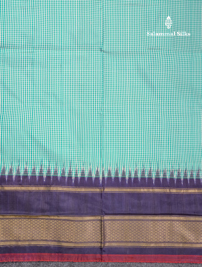 Sky Blue Tiny Checks Pure Kanjivaram Silk Saree With Contrast Navy Blue Pochampalli Pallu And Blouse