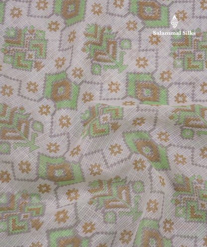 Beautiful Parrot Green Kota Cotton Fancy Saree With Contrast Cream Sandal Border