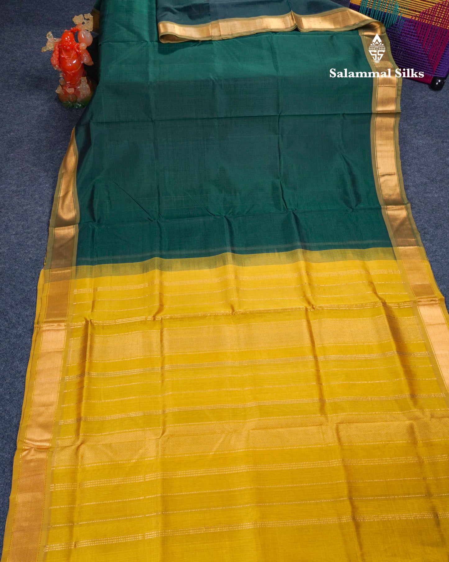 Bottle Green Plain Pure Silk Cotton Saree With Contrast Manthulir Yellow Blouse